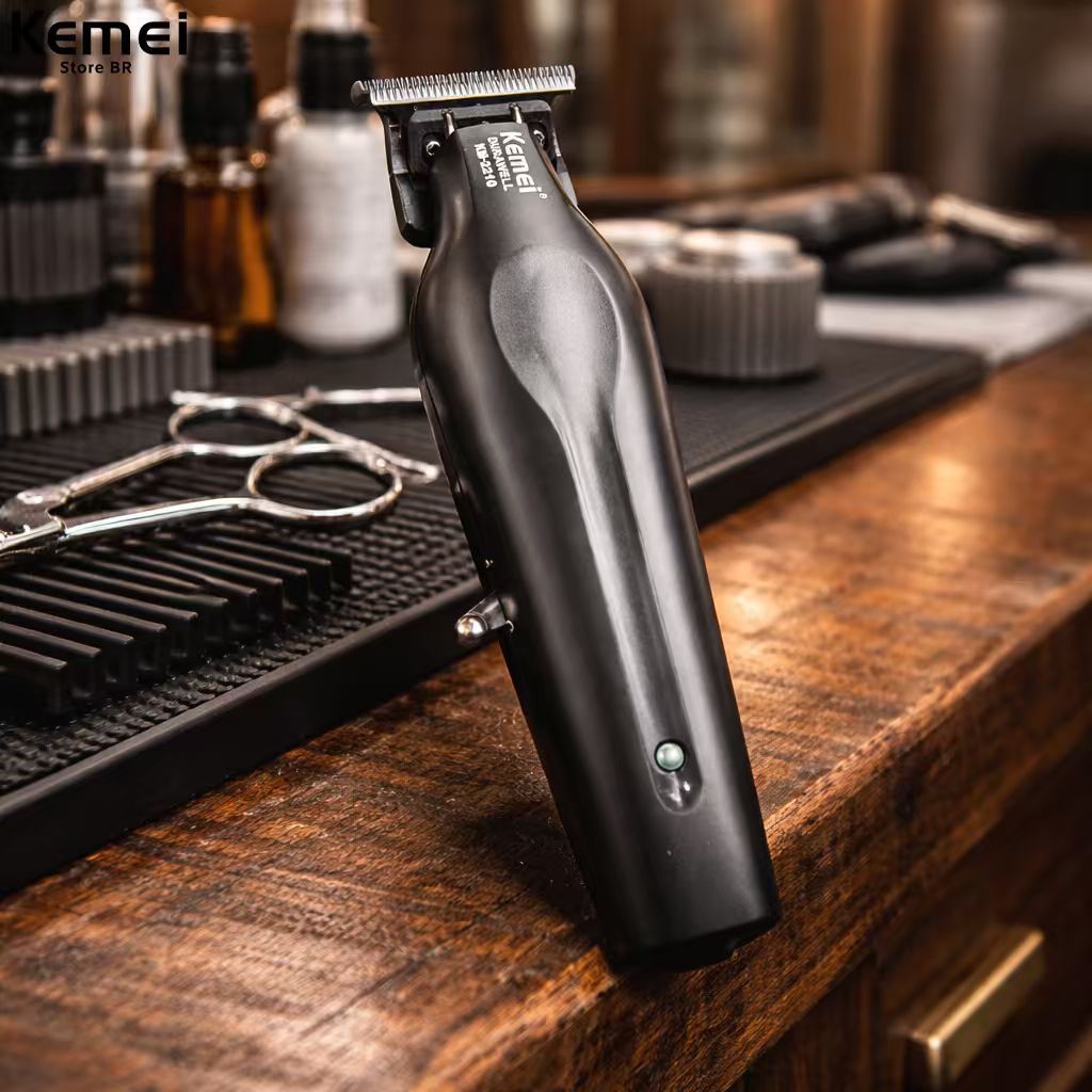 Kemei KM-2210 M?quina De Corte De Cabelo - 7.800 RPM - Port?til USB 1 Kemei KM - 2210 Máquina De Corte De Cabelo Aparador De Pêlos Recarregável Portátil USB 7.800 RPM 5W